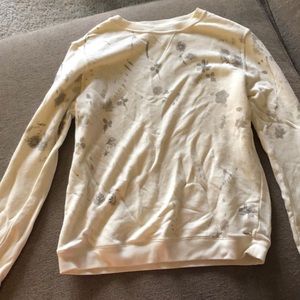 Crew neck cream colored sweatshirt